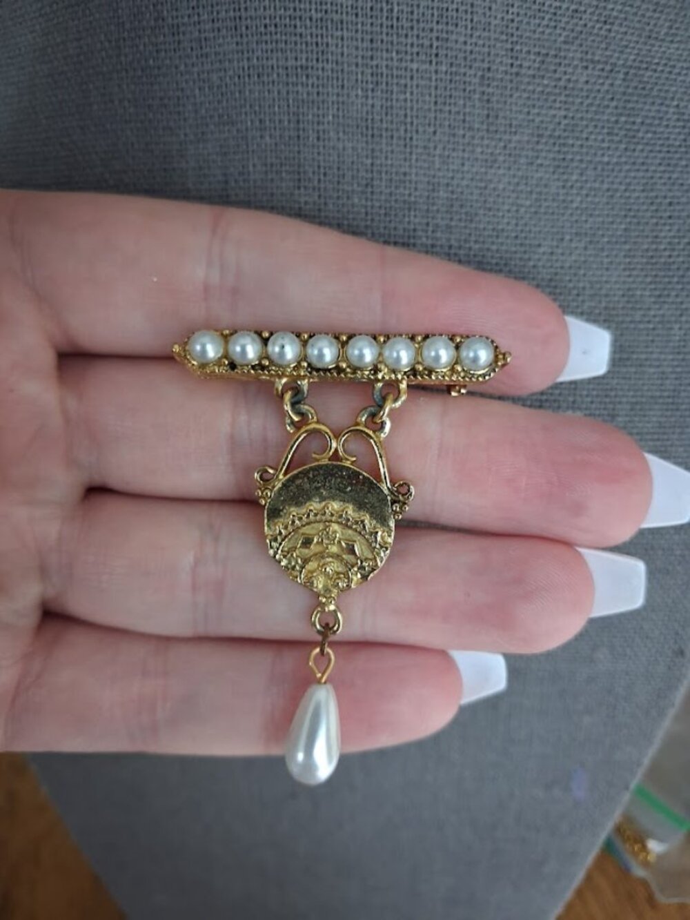 Unique dangle brooch